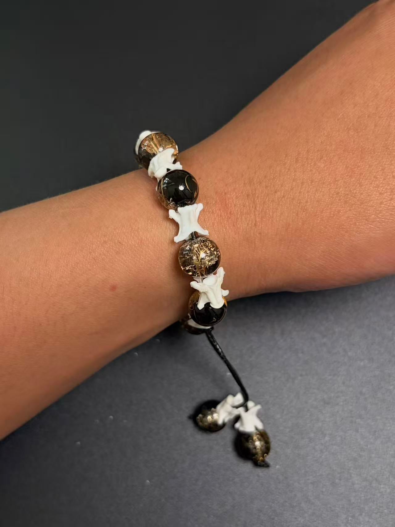 Real Snake Bone Bracelet – Black Onyx & Gold Lightning Lampwork Glass Beads, Vertebrae Spacers | Dark Luxury