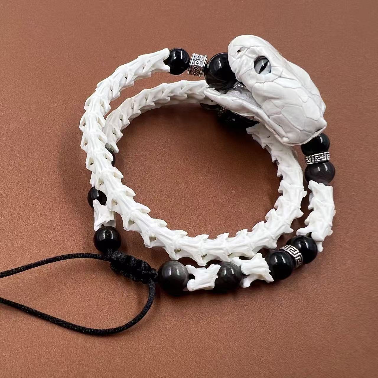 Real Snake Bone Bracelet — Black Obsidian Beads, Realistic Snake Head & Twin Sword Charms | Gothic Jewelry
