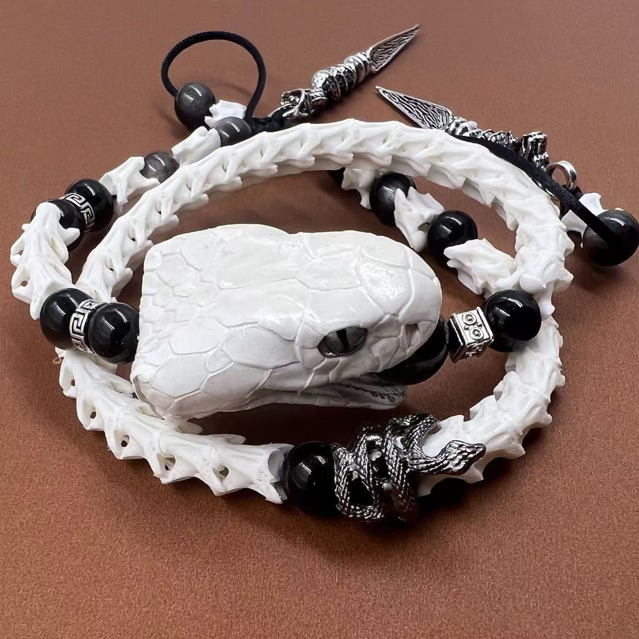 Real Snake Bone Bracelet — Black Obsidian Beads, Realistic Snake Head & Twin Sword Charms | Gothic Jewelry
