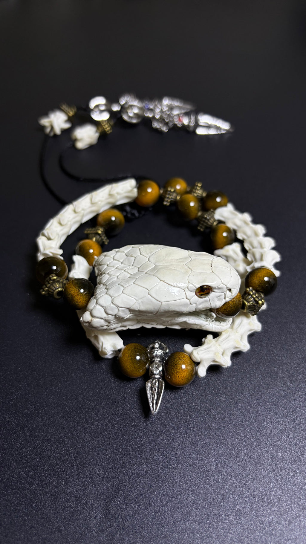 Real Snake Bone Bracelet — Tiger Eye & Tibetan Vajra Charm