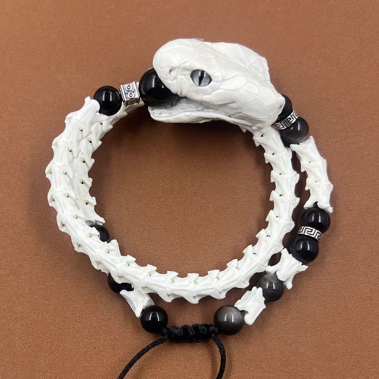 Real Snake Bone Bracelet — Black Obsidian Beads, Realistic Snake Head & Twin Sword Charms | Gothic Jewelry