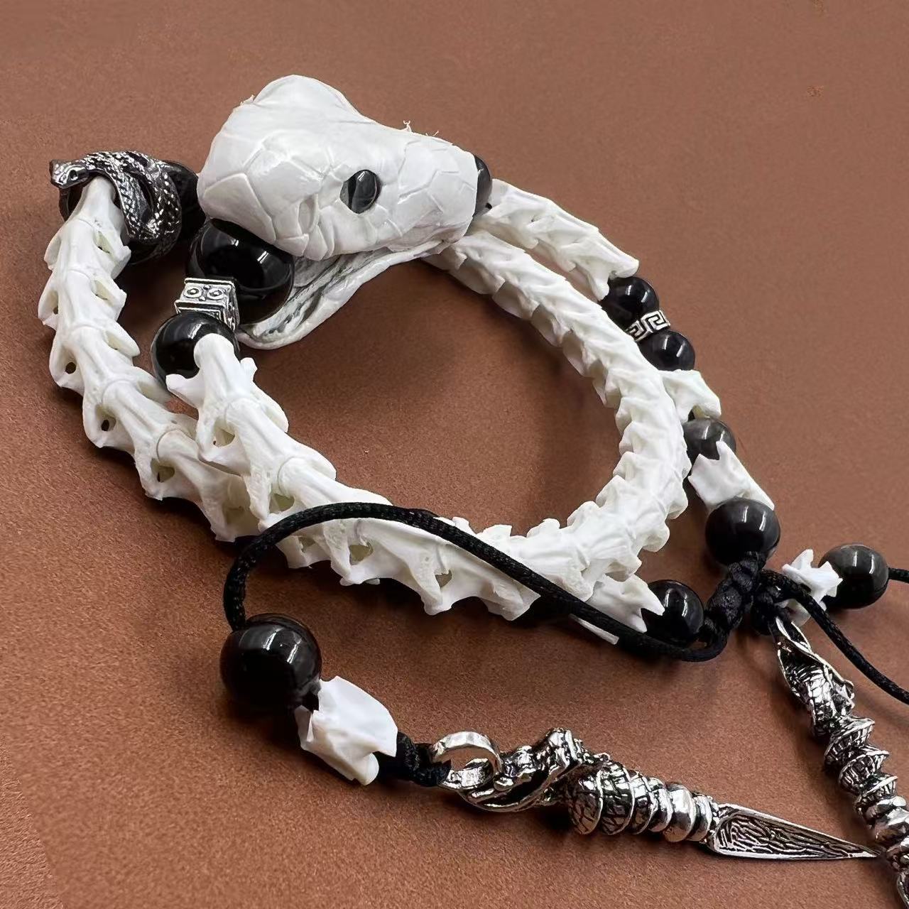 Real Snake Bone Bracelet — Black Obsidian Beads, Realistic Snake Head & Twin Sword Charms | Gothic Jewelry