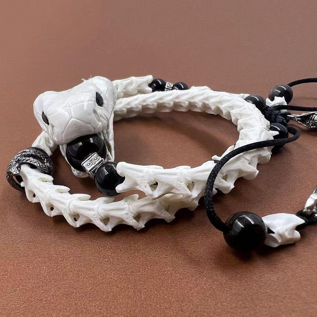 Real Snake Bone Bracelet — Black Obsidian Beads, Realistic Snake Head & Twin Sword Charms | Gothic Jewelry