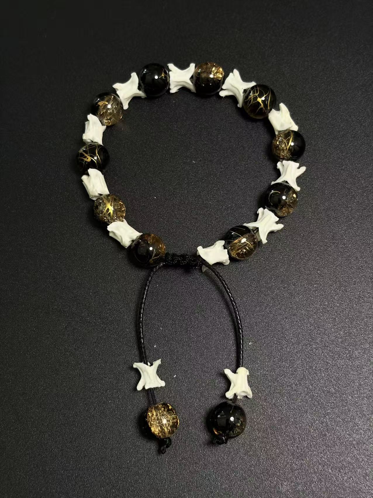 Real Snake Bone Bracelet – Black Onyx & Gold Lightning Lampwork Glass Beads, Vertebrae Spacers | Dark Luxury