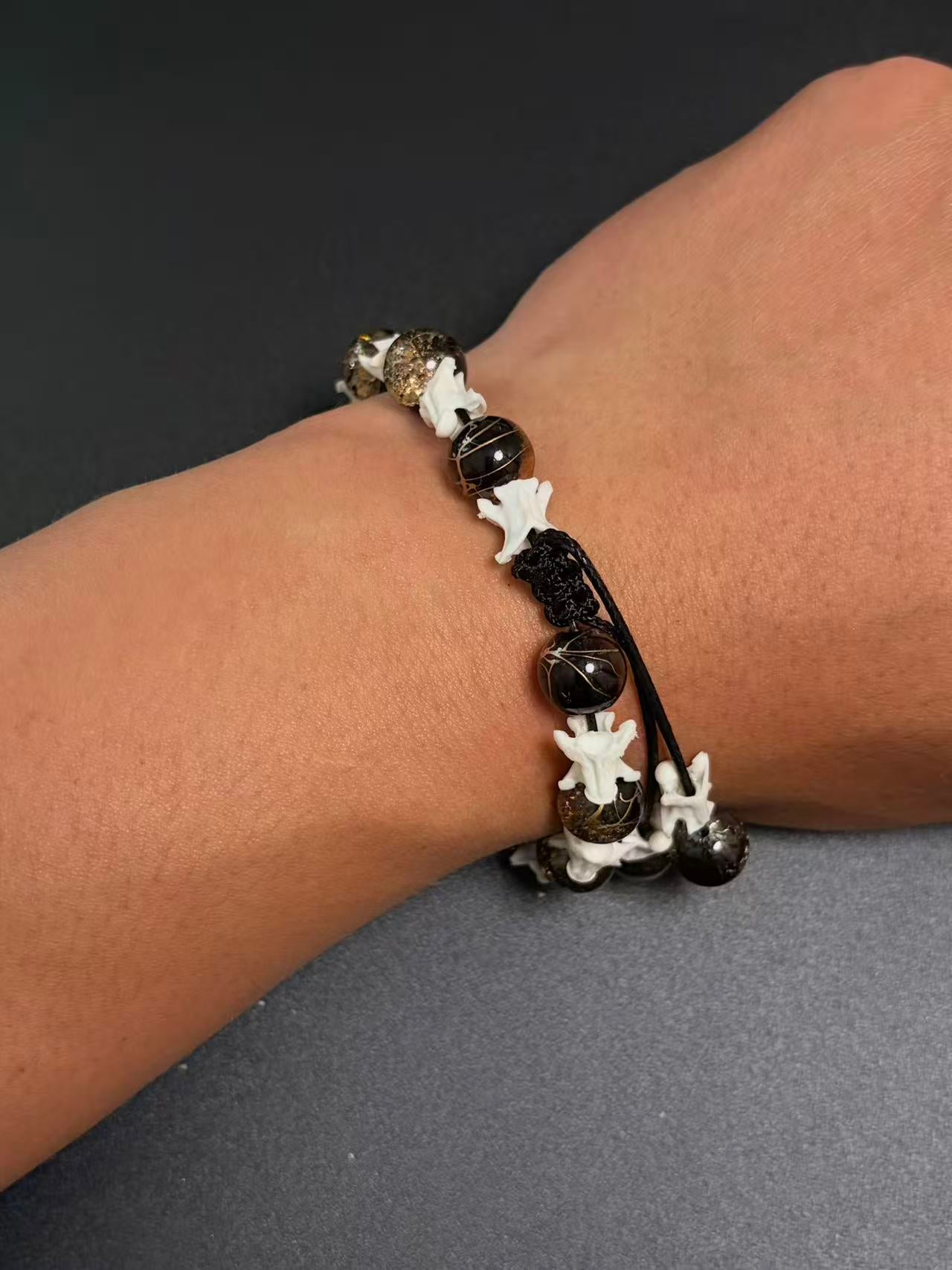 Real Snake Bone Bracelet – Black Onyx & Gold Lightning Lampwork Glass Beads, Vertebrae Spacers | Dark Luxury
