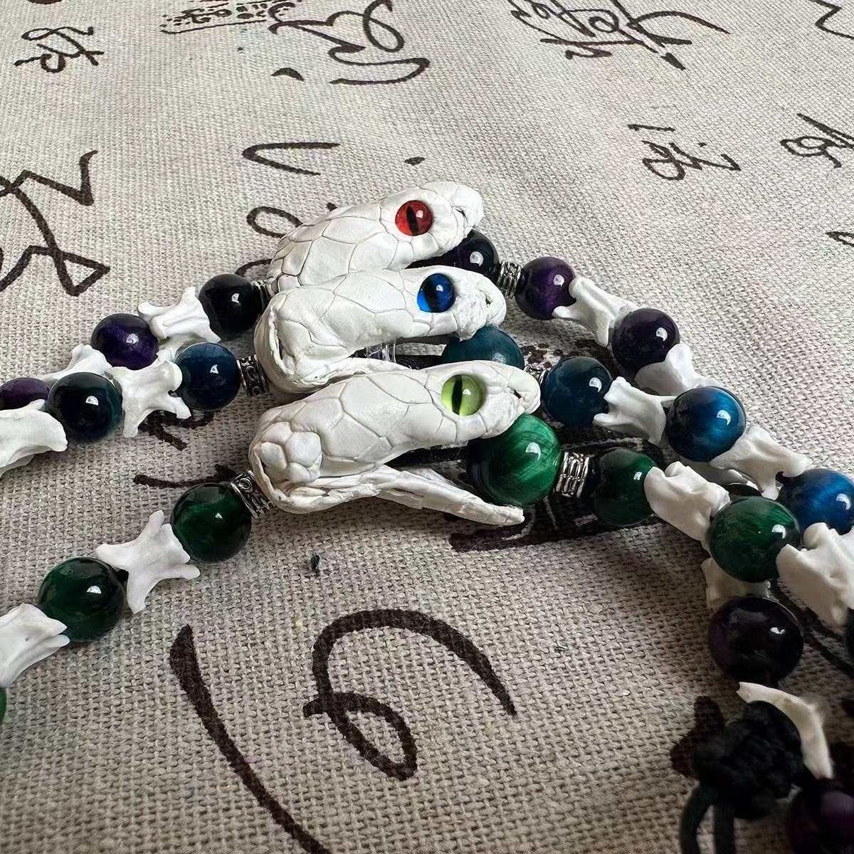 Real Snake Bone Ouroboros Bracelet — Snake Head Clasp, Natural Gemstones & Sword Charm | 3 Colors