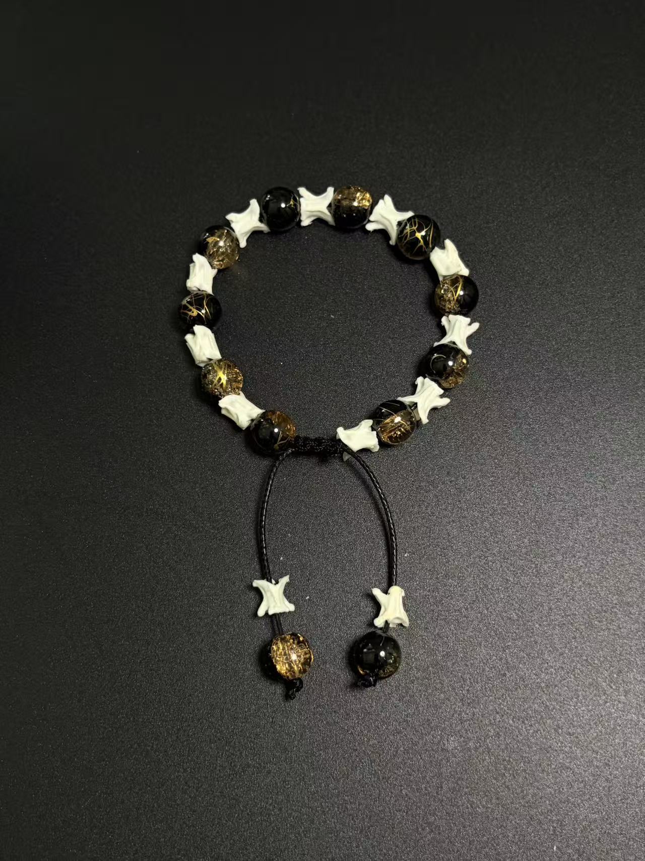 Real Snake Bone Bracelet – Black Onyx & Gold Lightning Lampwork Glass Beads, Vertebrae Spacers | Dark Luxury