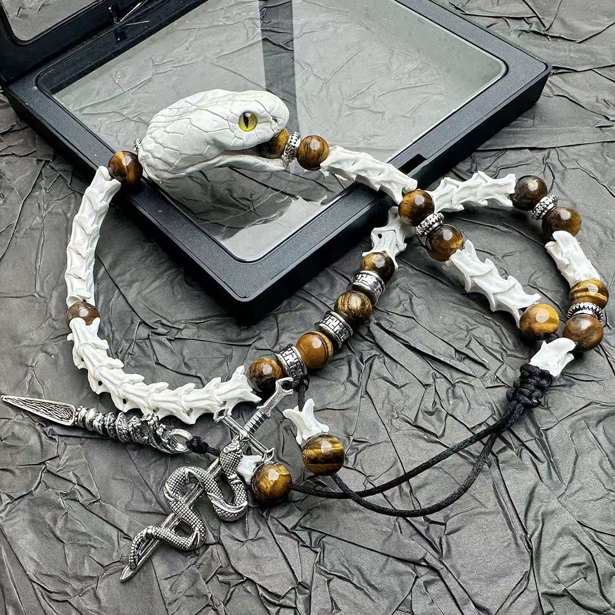 Real Snake Bone Bracelet — Tiger's Eye Beads & Sword Charm | Gothic Tibetan Jewelry